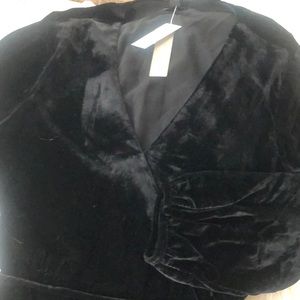 J crew new Black Velvet with side Zipper long sleeves, says large/med